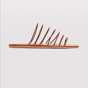 Brand new St. Agni Seni Slide in Earth. Size 39.